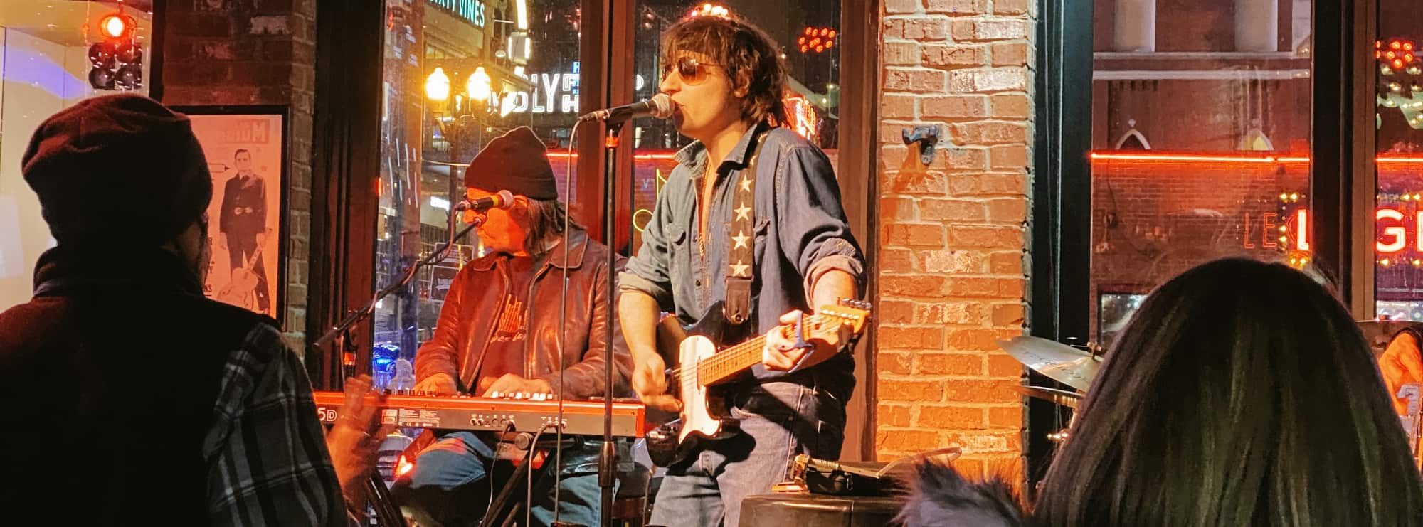 bar singer on guitar in Pensacola