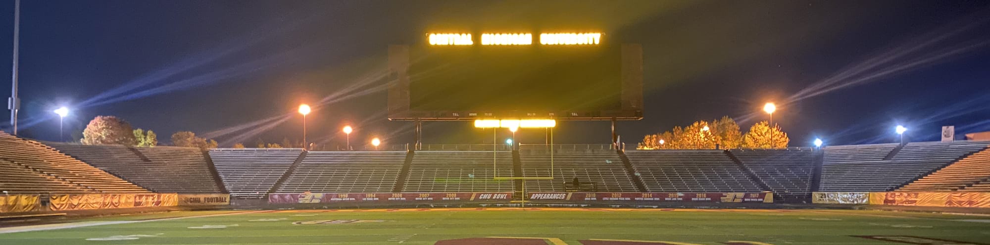 empty football stadium at night under the lights Pensacola
