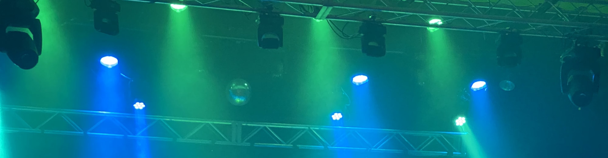 blue and green theater stage lights Pensacola