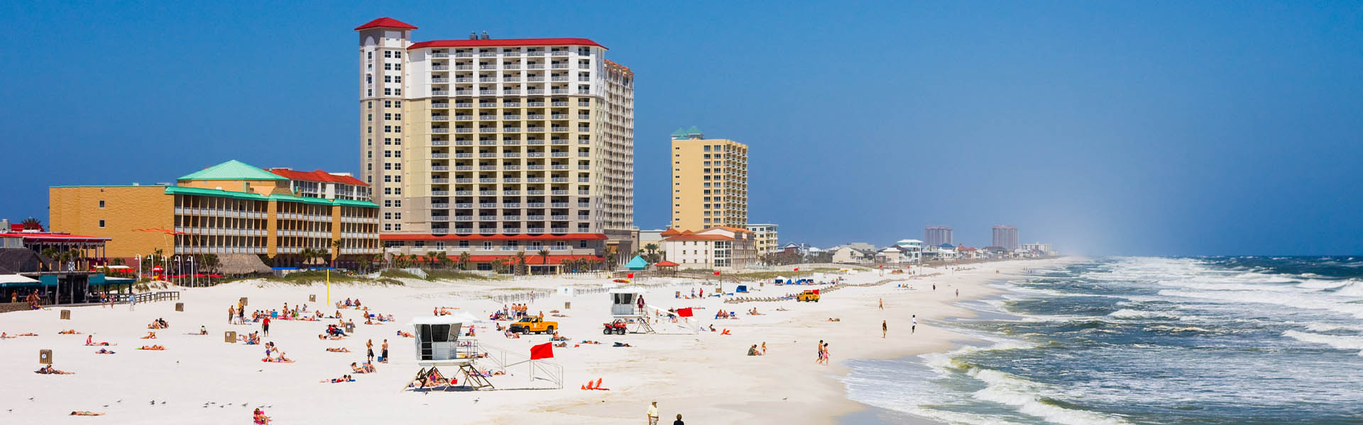 Neon color image of a band playing and people singing along